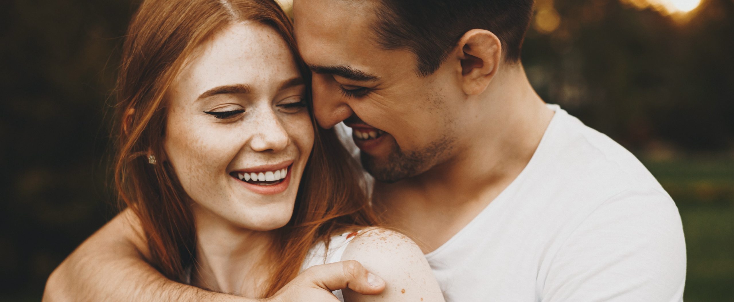 Happy couple, in love, embracing, thriving.